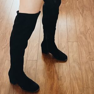 over the knees black heeled boots